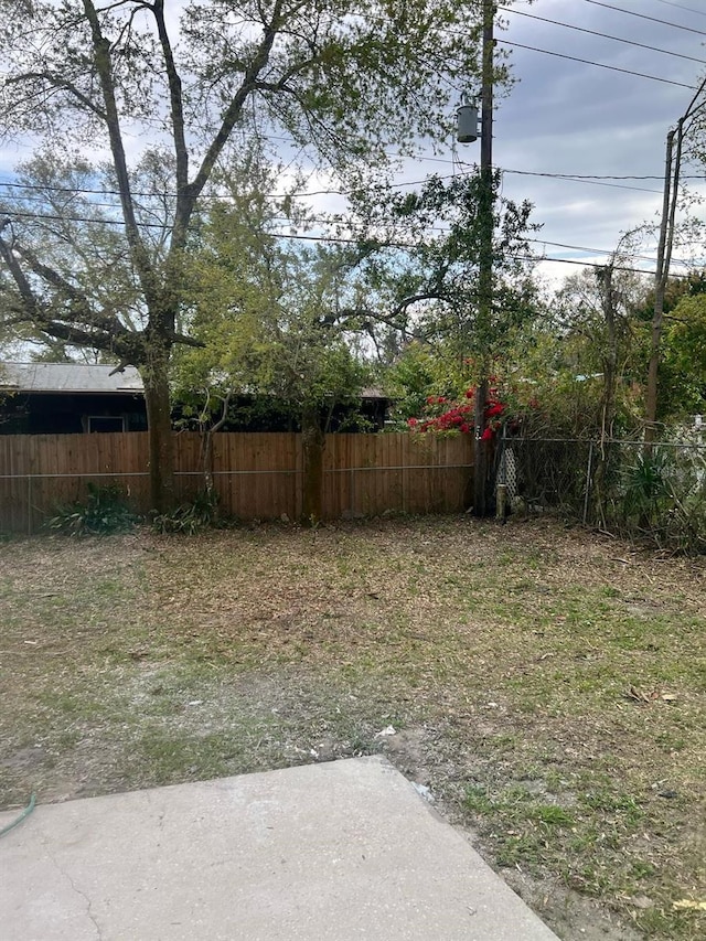 6130 Gamble Dr, Orlando, FL 32808 - view of yard featuring fence