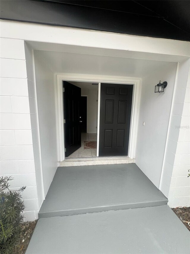 6130 Gamble Dr, Orlando, FL 32808 - entrance to property with concrete block siding
