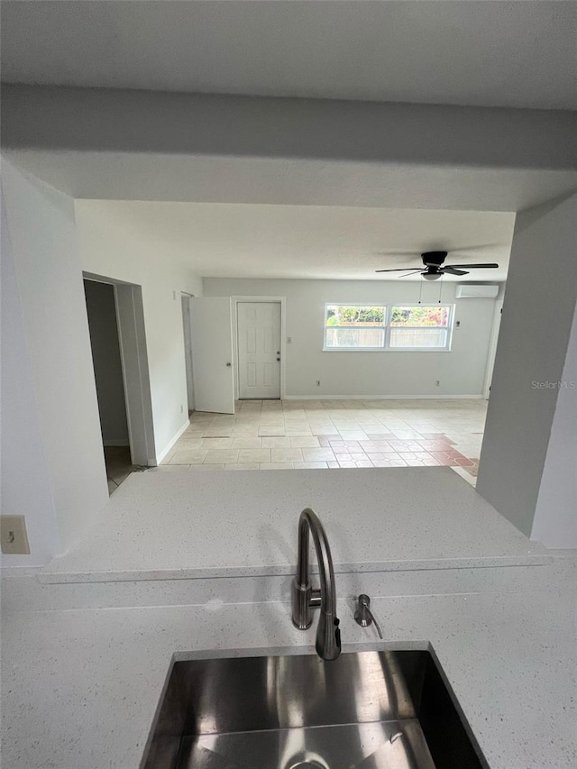 6130 Gamble Dr, Orlando, FL 32808 - kitchen with ceiling fan and a sink