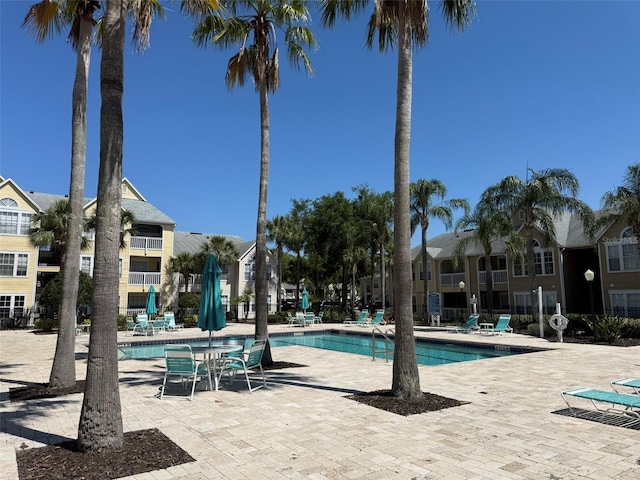 pool with a patio