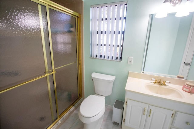 613 Andrew St, Altamonte Springs, FL 32714 - full bathroom with a shower stall, vanity, toilet, tile patterned flooring, and baseboards