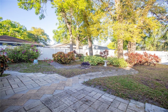 613 Andrew St, Altamonte Springs, FL 32714 - fenced backyard featuring a patio