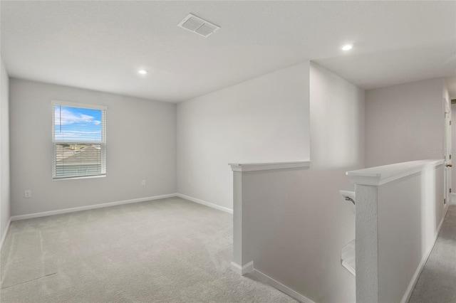 1506 Finnigan Cir, Haines City, FL 33844 - carpeted spare room with visible vents, recessed lighting, and baseboards