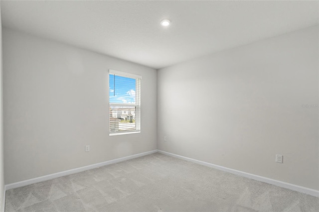 1506 Finnigan Cir, Haines City, FL 33844 - unfurnished room featuring light colored carpet and baseboards