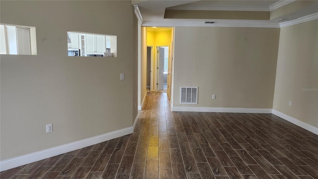 2749 Sand Oak Loop, Apopka, FL 32712 - unfurnished room with a tray ceiling, crown molding, and dark wood-style flooring