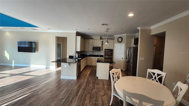 2749 Sand Oak Loop, Apopka, FL 32712 - kitchen with appliances with stainless steel finishes, a peninsula, dark countertops, tasteful backsplash, and crown molding