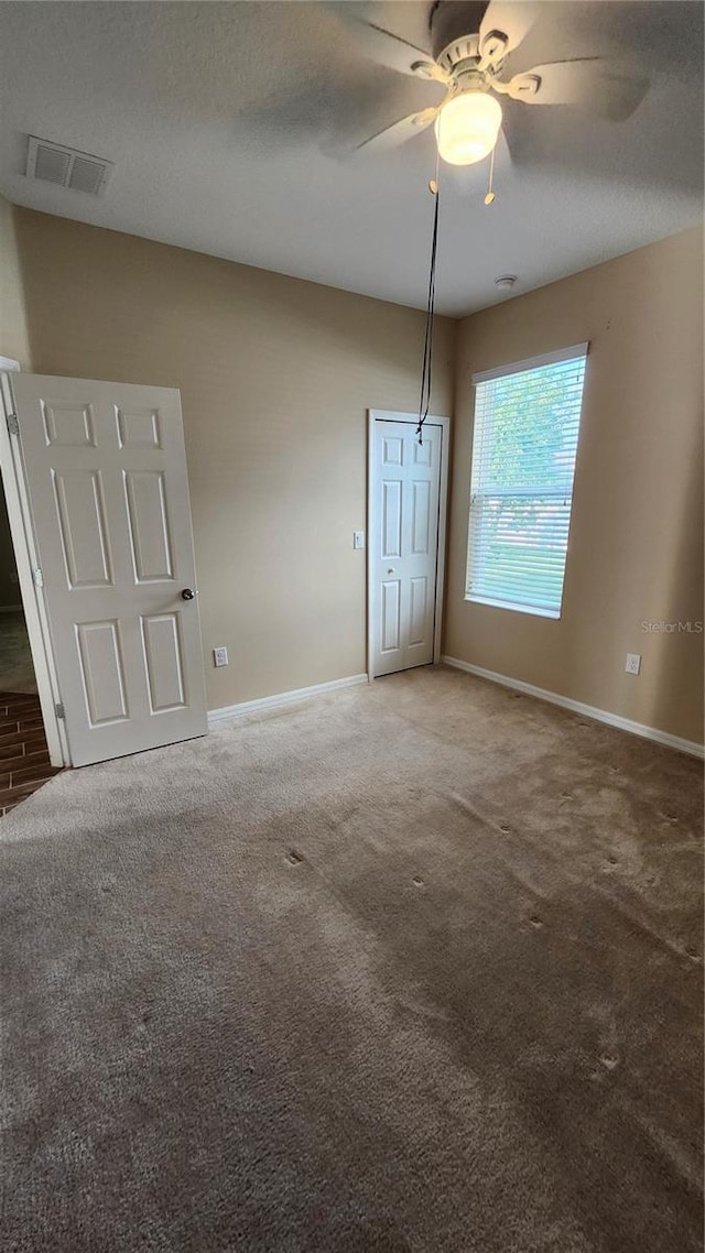 2749 Sand Oak Loop, Apopka, FL 32712 - carpeted empty room featuring baseboards and ceiling fan