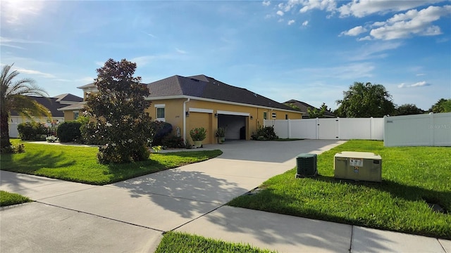 2749 Sand Oak Loop, Apopka, FL 32712 - view of front facade with a garage, a gate, stucco siding, and driveway