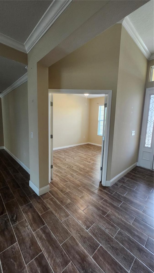 2749 Sand Oak Loop, Apopka, FL 32712 - entryway with ornamental molding, wood tiled floors, vaulted ceiling, and a textured ceiling