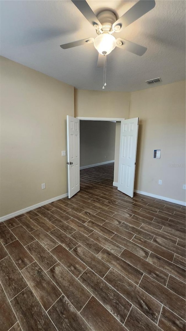 2749 Sand Oak Loop, Apopka, FL 32712 - unfurnished room with ceiling fan and dark wood-style flooring