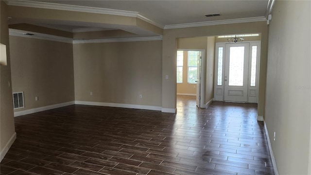 2749 Sand Oak Loop, Apopka, FL 32712 - foyer entrance featuring dark wood-style flooring and crown molding