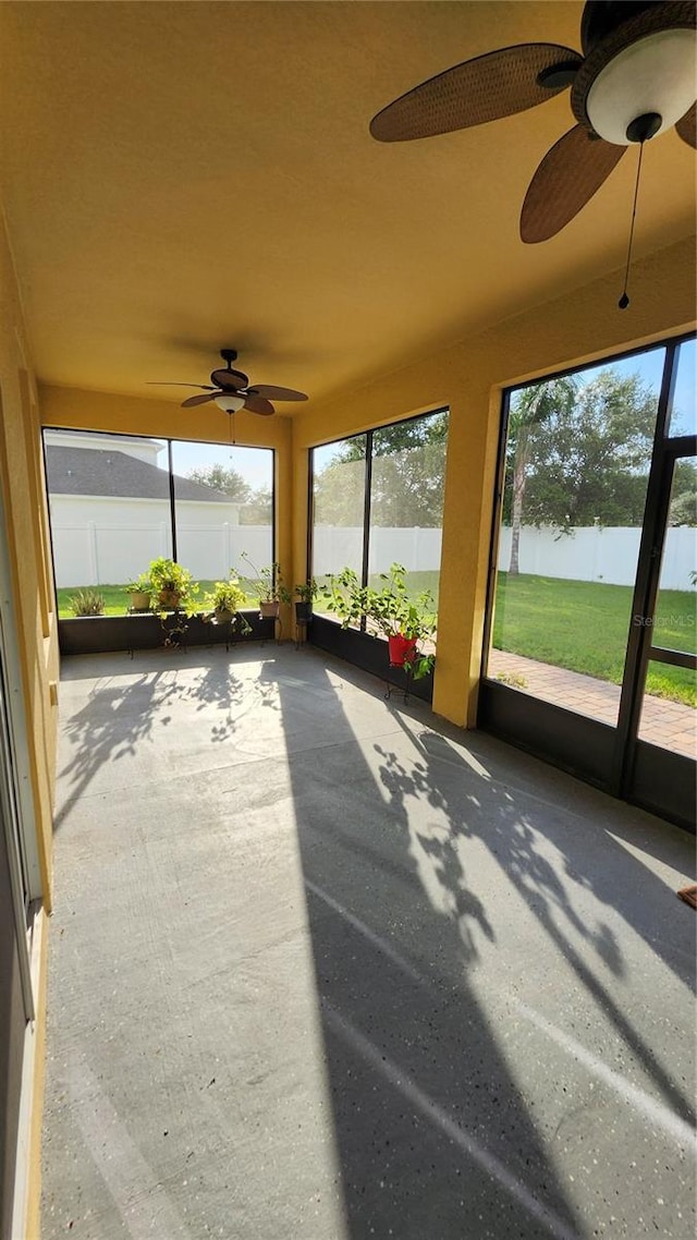 2749 Sand Oak Loop, Apopka, FL 32712 - unfurnished sunroom featuring ceiling fan and plenty of natural light
