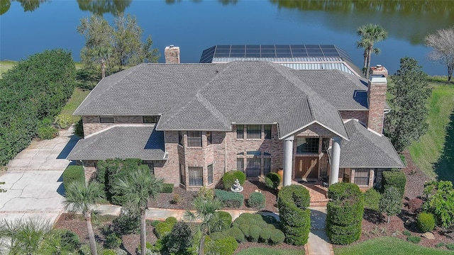 132 Pleasant Valley Dr, Daytona Beach, FL 32114 - view of front facade featuring a water view and a chimney
