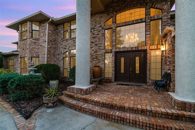 132 Pleasant Valley Dr, Daytona Beach, FL 32114 - property entrance featuring brick siding