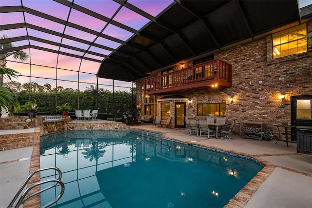132 Pleasant Valley Dr, Daytona Beach, FL 32114 - pool featuring outdoor dining area, a patio, an in ground hot tub, and a lanai