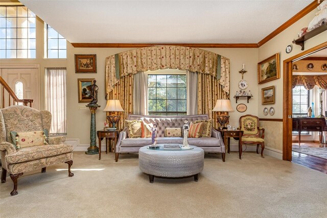 132 Pleasant Valley Dr, Daytona Beach, FL 32114 - living room featuring plenty of natural light, ornamental molding, and carpet floors