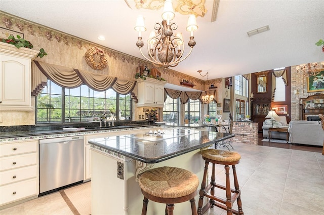 132 Pleasant Valley Dr, Daytona Beach, FL 32114 - kitchen with visible vents, an inviting chandelier, a sink, electric cooktop, and dishwasher