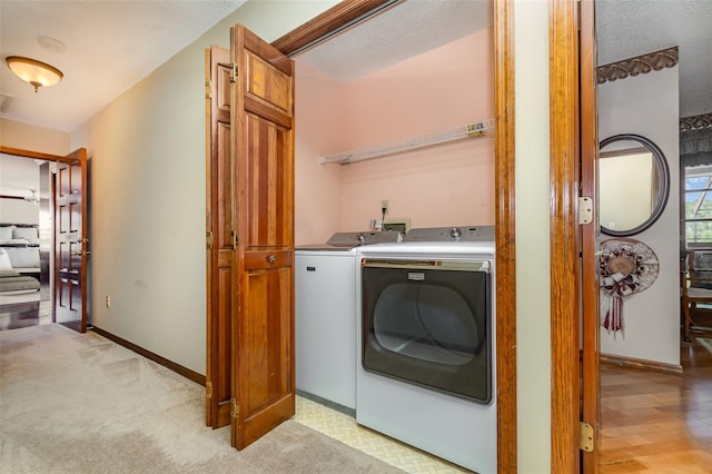 132 Pleasant Valley Dr, Daytona Beach, FL 32114 - laundry area with baseboards, laundry area, and washing machine and clothes dryer