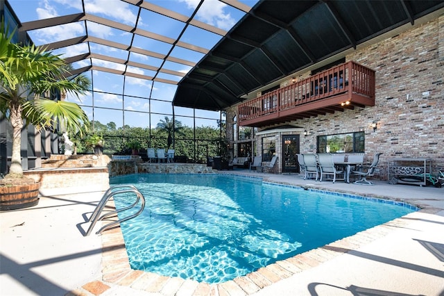 132 Pleasant Valley Dr, Daytona Beach, FL 32114 - pool with glass enclosure and a patio area
