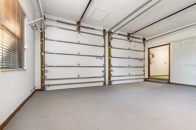 132 Pleasant Valley Dr, Daytona Beach, FL 32114 - garage with baseboards