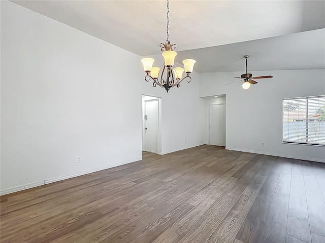 2253 Atrium Cir, Orlando, FL 32808 - empty room featuring wood finished floors, vaulted ceiling, a chandelier, a ceiling fan, and baseboards