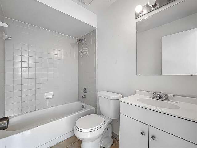 2253 Atrium Cir, Orlando, FL 32808 - bathroom featuring toilet, shower / bathtub combination, vanity, and tile patterned flooring