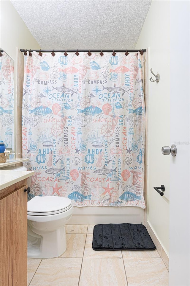 1260 Parkside Green Dr Unit D, Greenacres, FL 33415 - bathroom with vanity, shower / bath combo, a textured ceiling, tile patterned floors, and toilet