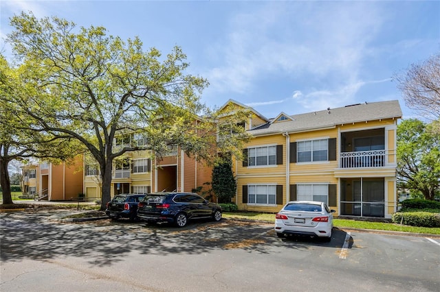 2314 Midtown Ter Unit 1136, Orlando, FL 32839 - view of property featuring uncovered parking