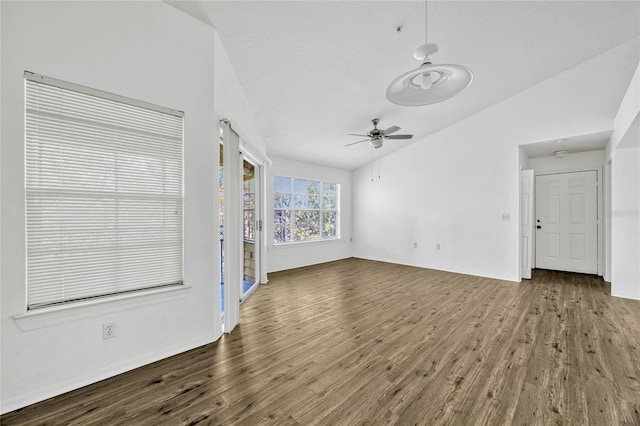 2314 Midtown Ter Unit 1136, Orlando, FL 32839 - unfurnished room with baseboards, lofted ceiling, wood finished floors, and a ceiling fan