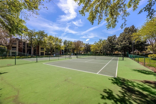 2314 Midtown Ter Unit 1136, Orlando, FL 32839 - view of tennis court featuring fence