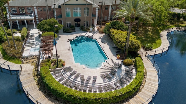 2314 Midtown Ter Unit 1136, Orlando, FL 32839 - pool featuring a water view and fence
