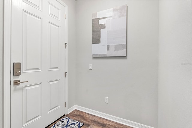 4622 Eureka Ln, Sanford, FL 32773 - entryway featuring baseboards and dark wood finished floors