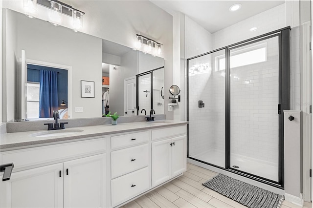 4622 Eureka Ln, Sanford, FL 32773 - full bathroom with a shower stall, double vanity, and a sink