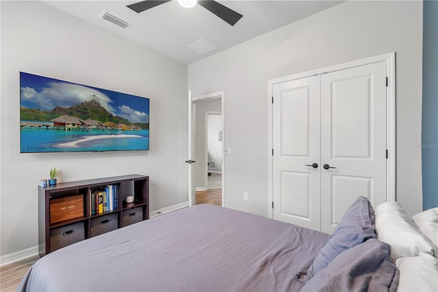 4622 Eureka Ln, Sanford, FL 32773 - bedroom with wood finished floors, baseboards, visible vents, ceiling fan, and a closet