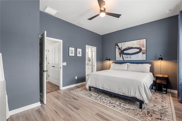 4622 Eureka Ln, Sanford, FL 32773 - bedroom with ensuite bath, baseboards, visible vents, and light wood finished floors