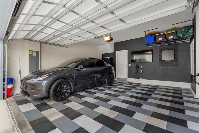 4622 Eureka Ln, Sanford, FL 32773 - garage featuring concrete block wall, electric panel, a garage door opener, and baseboards