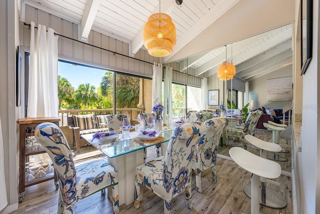 204 Tomoka Trl Unit 204, Longwood, FL 32779 - dining space featuring wood finished floors and lofted ceiling with beams