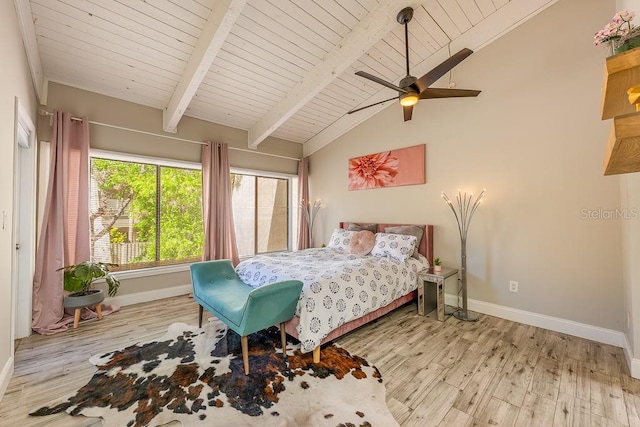 204 Tomoka Trl Unit 204, Longwood, FL 32779 - bedroom featuring ceiling fan, lofted ceiling with beams, wood ceiling, wood finished floors, and baseboards