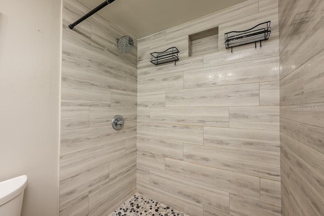 204 Tomoka Trl Unit 204, Longwood, FL 32779 - bathroom featuring toilet and tiled shower
