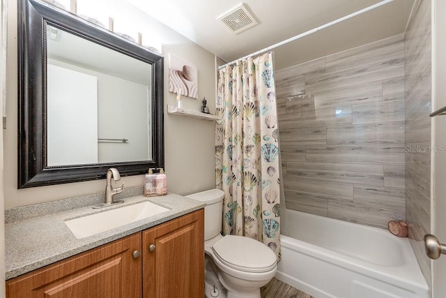 204 Tomoka Trl Unit 204, Longwood, FL 32779 - full bathroom with vanity, shower / tub combo, visible vents, and toilet