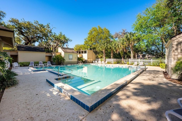 204 Tomoka Trl Unit 204, Longwood, FL 32779 - community pool with a patio area, fence, and an outdoor structure