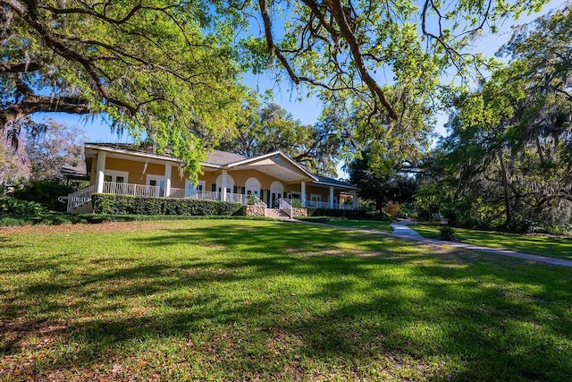 204 Tomoka Trl Unit 204, Longwood, FL 32779 - view of front facade featuring covered porch and a front yard