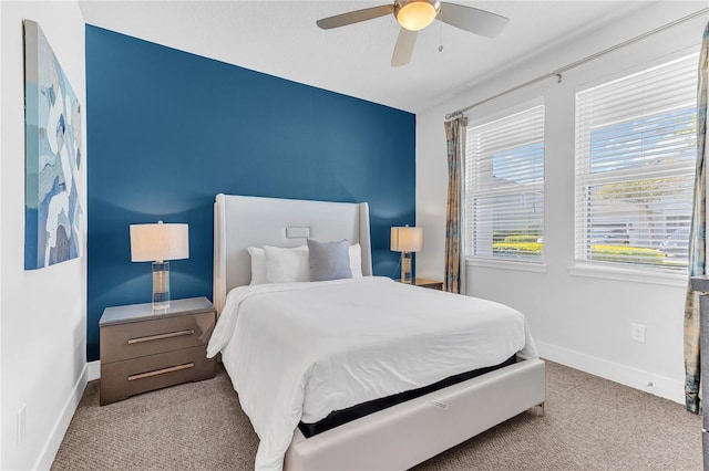 501 Burma St, Kissimmee, FL 34747 - carpeted bedroom featuring baseboards and ceiling fan