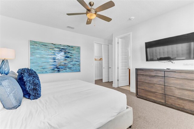 501 Burma St, Kissimmee, FL 34747 - carpeted bedroom featuring a ceiling fan and visible vents