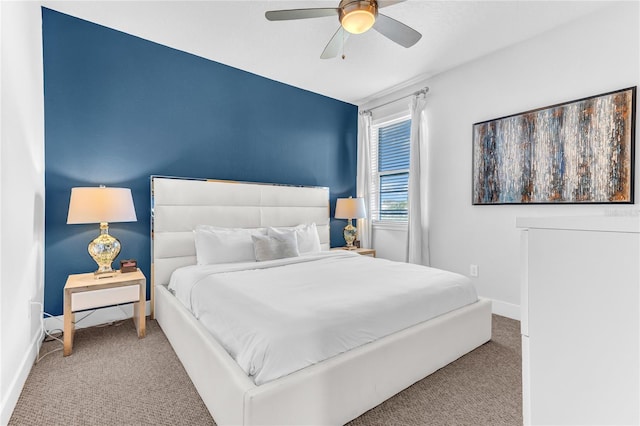 501 Burma St, Kissimmee, FL 34747 - carpeted bedroom with a ceiling fan and baseboards