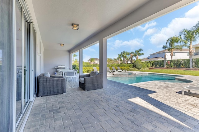 501 Burma St, Kissimmee, FL 34747 - view of swimming pool featuring a patio and a pool with connected hot tub