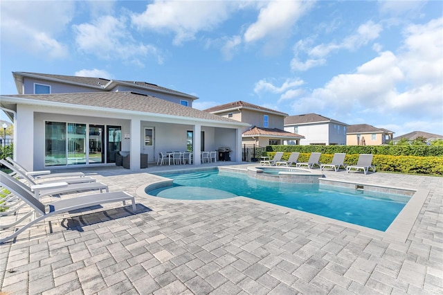 501 Burma St, Kissimmee, FL 34747 - view of pool with a patio and a pool with connected hot tub