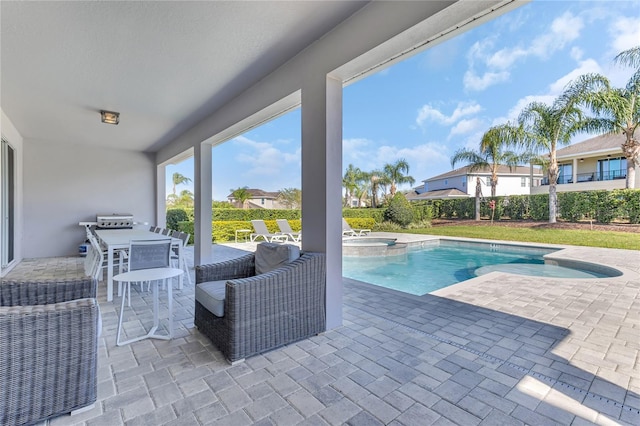 501 Burma St, Kissimmee, FL 34747 - view of pool featuring a patio and a pool with connected hot tub
