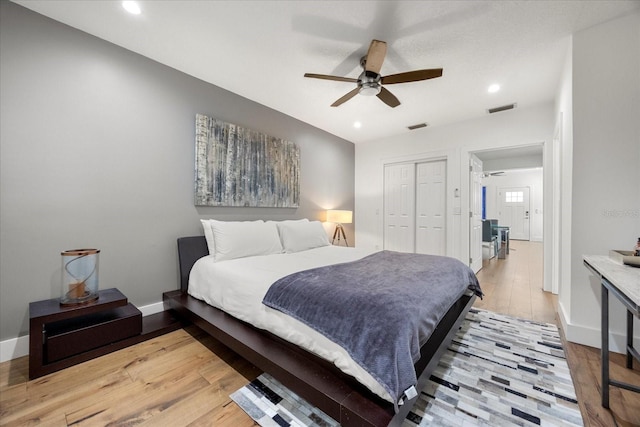 7841 Georgeann St, Winter Park, FL 32792 - bedroom with light wood-style flooring, a closet, baseboards, recessed lighting, and a ceiling fan
