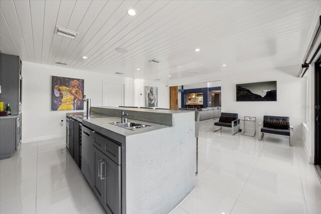 7841 Georgeann St, Winter Park, FL 32792 - kitchen with a sink, light tile patterned floors, recessed lighting, open floor plan, and stainless steel dishwasher